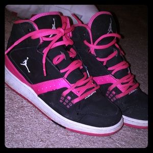 Pink and black jordans